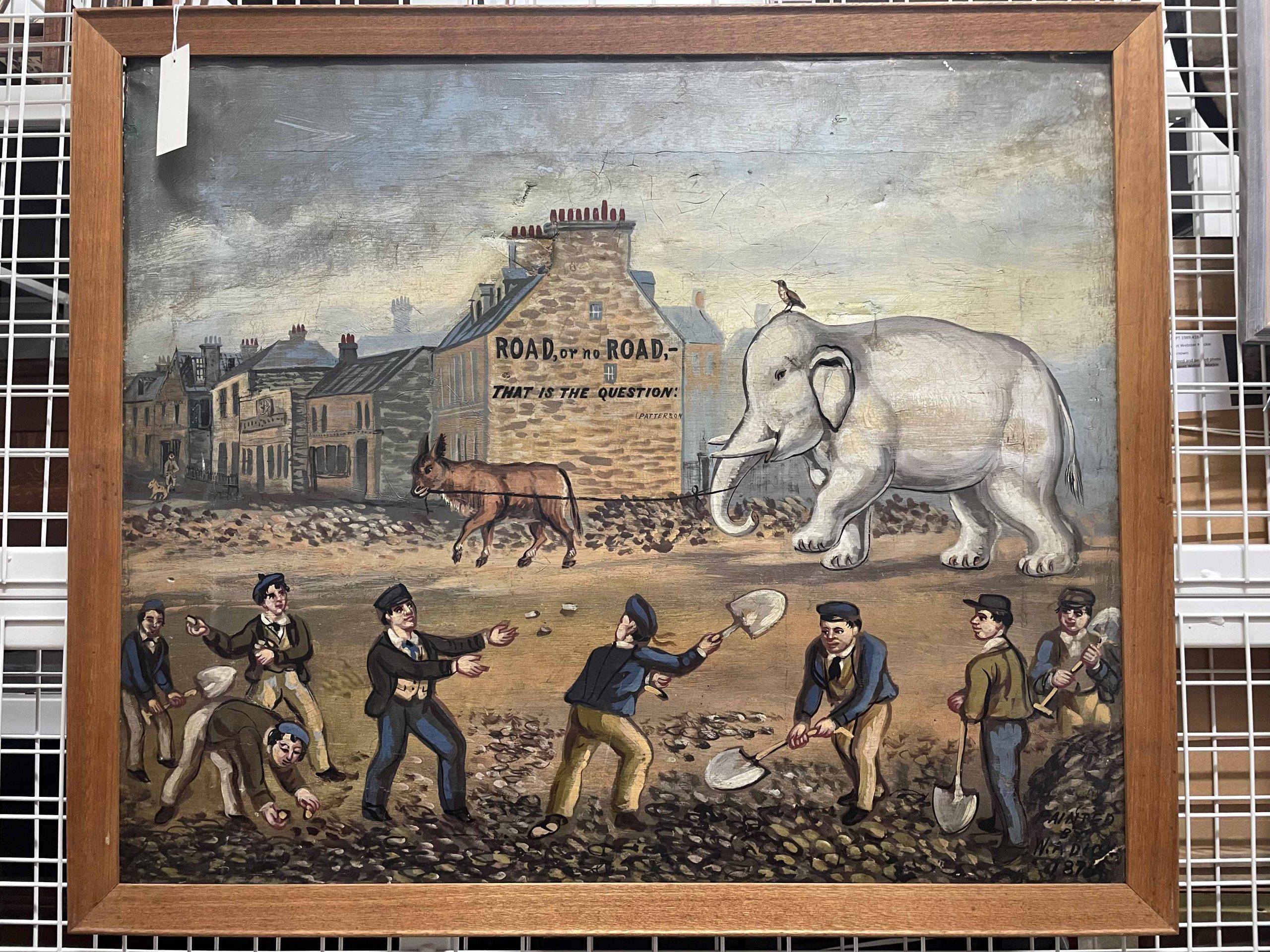 Satirical painting showing the construction of the Links Road. Several workmen are shown in the foreground, with a large white elephant being led by a donkey shown in the foreground. 'Road or no road that is the question' is written on the gable end of a building in the centre background.